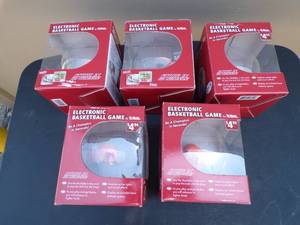 lot 101 image: 5 Hand Held Electric Plastic Ball Basketball Games, Might Need Batteries, Uses Button Cells, Styles May Vary