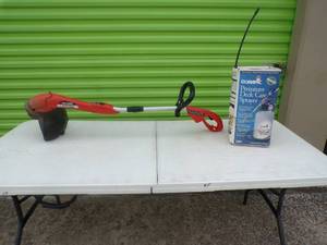 lot 131 image: Black and Decker Grass Hog Electric Weed Eater AND Olympic Premium Deck Care Sprayer, Used