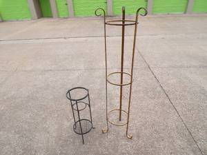 lot 133 image: 2- Metal Plant Stands, 1-Black About 8 x 22, 1-Gold Tone About 10 x 50