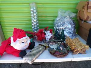 lot 189 image: Lot of Mixed Holiday Items Including Ornaments, Santa, Wreath, Gold Tree Beads, Tree Stand