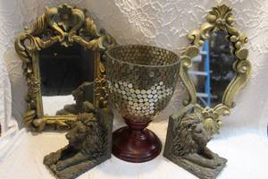 lot 25 image: lion book ends  vase and 2 decorative mirrors