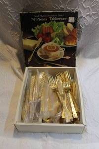 lot 35 image: gold-plated stainless-steel tableware there is not 74 a few is missing