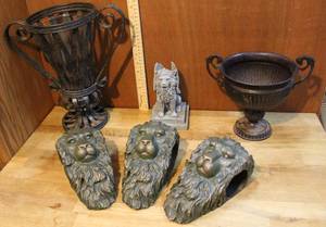 lot 142 image: decretive vases and lion heads and more see pics