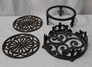 lot 174 image: To cast iron rivets and Cast Iron Fleur-de-lis Plate Holder and stand