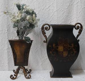 lot 184 image: decorative vase featuring a prominent coat of arms design. Vase with feet that is slim see all pictures