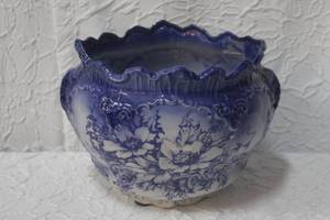 lot 222 image: The Reme Collection Made in England Flo Blue Planter. It measures 8 tall, with 8 14 opening and 7 base. T are no chips or cracks,