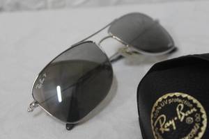 lot 234 image: Ray-Ban Chromance sun glasses with cas and a wood box