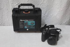 lot 236 image: Sony digital camera 20.1 mega pixel DSC-H300 35X optical zoom and an Apache 1800 weatherproof protective case