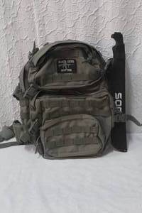 lot 249 image: Backpack and  machete knife