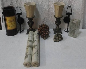 lot 285 image: Two rolls of contact paper and candle holders and wine bottle holder and more decor seen in pictures