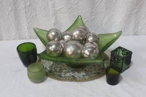 lot 289 image: Green star shaped bowl with a mix of green candle holders and decorative balls and more see pictures