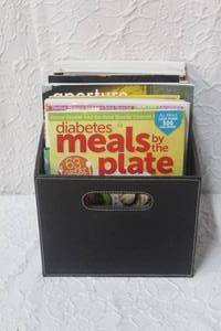 lot 344 image: Reusable box full of magazines