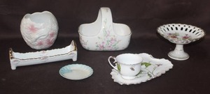 lot 399 image: Porcelain cracker dish thats shaped almost like a baby bed and vase with hands on it and I JARDIN TEA AND TOAST SET and much more see pictures