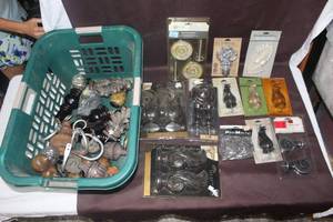 lot 471 image: basket full of curtain hooks