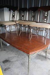 lot 505 image: Dining room table and chairs the  chairs are solid metal table is extremely heavy