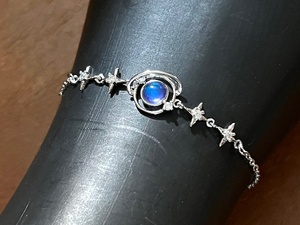 lot 23 image: .925 Sterling Silver Moonstone Planet Bracelet