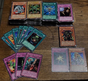lot 107 image: 450 Vintage Yu-Gi-Oh Cards - Including Spell Cards, Trap Cards, &amp 27 Rare, Super Rare, or Ultra Rare Cards