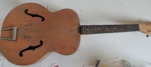 lot 415 image: unfinished hollow body arched top guitar resembles a Kay p-4