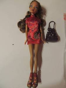 lot 436 image: bratz doll has outfit shoes and purse