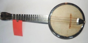 lot 848 image: Dixie- banjolele aka- banjo ukulele - 4 strings metal