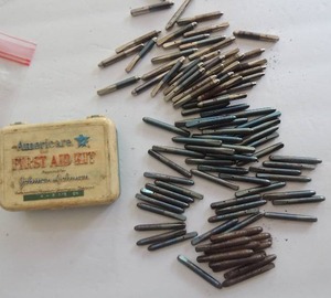 lot 1412 image: Piano tuning pins & jj first aid kit plastic boy