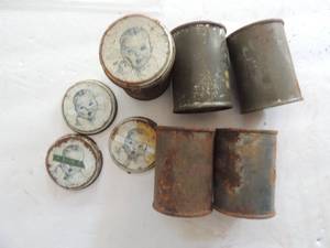 lot 1413 image: Gerber metal tins - 5 tins , 4 Gerber lids 1940s