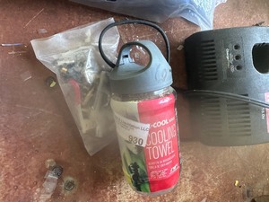 lot 930 image: COOLING  TOWEL,  RYOBI  12V CHARGER