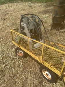 lot 1841 image: lawn wagon  - NEEDS 1 HANDLE & 1 TIRE  PLUS A HOSE RELL