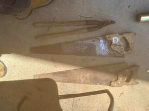 lot 1604 image: 2 handsaws and 1 lopper