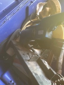 lot 1644 image: blue crate with small chop saw brick tote u bolts and more