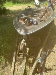 lot 1784 image: tide craft with Suzuki motor 16 needs tlc last registration 1998