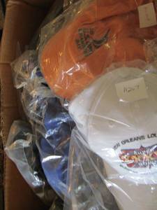 lot 40 image: box full of various ball caps