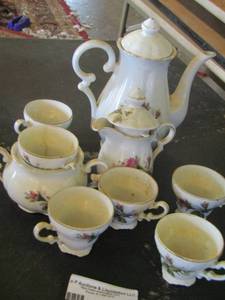 lot 46 image: pink flower tea cup set with tea pot, creamer and sugar dish with 7 handled cups