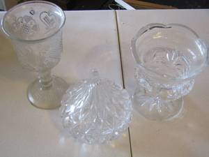 lot 63 image: Hershey kiss covered candy jar, wine glass, sherbet glass