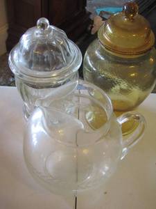 lot 64 image: qty 2 covered canisters and a large handled pitcher