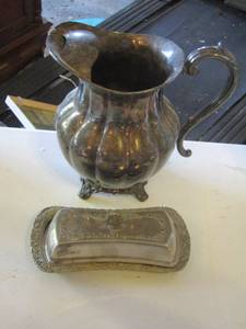 lot 65 image: silver plate butter dish and handled tea potpitcher