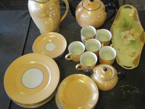 lot 69 image: Germany yellow dish set tea pot, creamer, sugar , 6 mini cups, saucers, tea plates and dinner plates