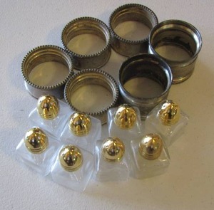 lot 84 image: mini salt and pepper shakers- napkin ring holders