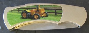 lot 100 image: yellow tractor knife 8 blade