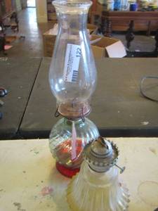 lot 122 image: oil lamps one missing the top