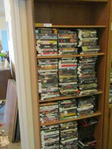 lot 187 image: book shelf 712812 full of DVDs  all types all for you the best buy
