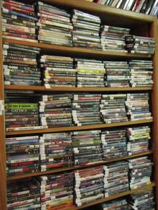lot 197 image: 844212 book shelf FULL OF DVDs ALL YOU CAN WATCH