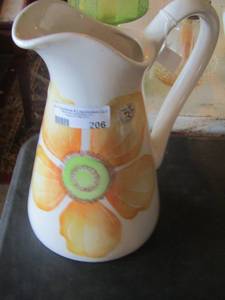 lot 206 image: flower handled drinking pitcher