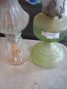 lot 218 image: qty 2 oil lamps one green and one is clear glass