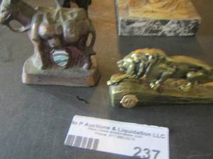 lot 237 image: animal home dcor qty 4 camel, lion, elephant and another lion