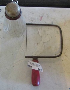 lot 261 image: handled saw and sugar dish