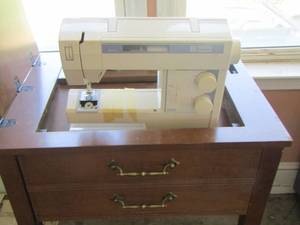 lot 297 image: sewing table with a Viking Husqvarna sewing machine