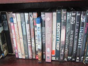 lot 302 image: shelf of dvds