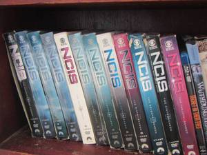 lot 304 image: shelf of dvds