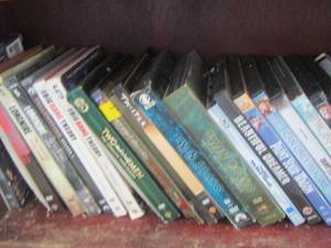lot 305 image: shelf of dvds